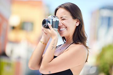 Image showing Travel, photography and woman with camera in miami taking pictures of the city, buildings or town on vacation. Photographer, girl on holiday or vacation taking photo for happy memory or moments