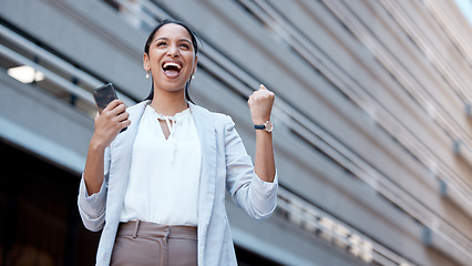 Image showing Phone, success celebration and woman in city after winning, deal or receiving startup funding. Wow, winner and Indian female excited, victory or celebrating financial goals, mission or sales targets.