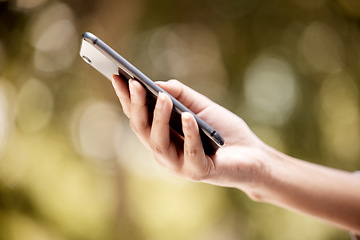 Image showing Hands, bokeh and social media communication with 5g technology connection outside close up. Tech leisure entertainment person holding smartphone with networking app and internet connectivity.