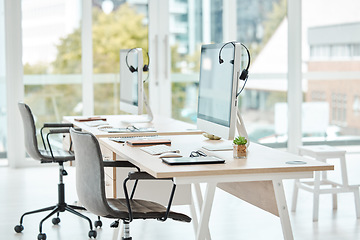 Image showing Computer, call center and empty office furniture in customer service, contact us support or crm consulting company. Telemarketing, communication headset or technology for sales, b2b business or help