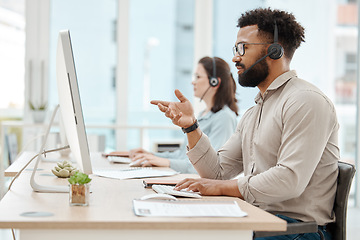 Image showing Black man, customer support service office and working for online call center internet telemarketing business. Crm consultant at desk, helping client and consulting computer software for advice