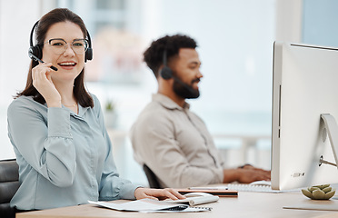 Image showing Contact us, call center and happy woman in insurance sales talking, helping and working at a customer service desk. Smile, telecom and telemarketing agent consulting or speaking on headset in Toronto