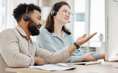 Image showing Call center staff teaching sales consultant, telemarketing employees and crm customer service workers on computer software in office agency. Business people training, coaching and consulting solution