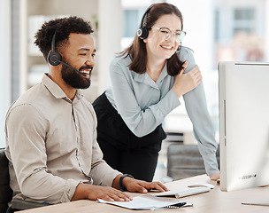 Image showing Diversity, call center and leader training agent or sales employee at contact support help desk customer service. Contact us, woman and telemarketing worker with a big smile after a successful deal