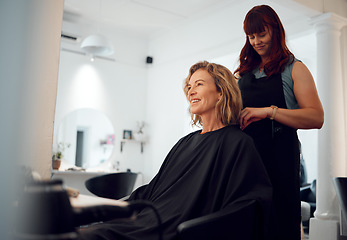 Image showing Beauty, hairdresser and happy customer at a salon for grooming, fancy and beautiful makeover. Smile, wellness and professional stylist working on an elegant senior client or mature woman in Canada