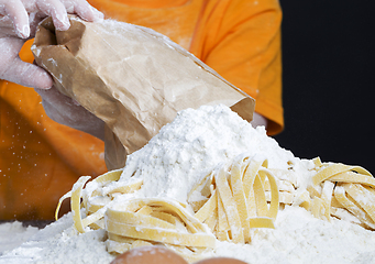 Image showing a child with a bag of flour