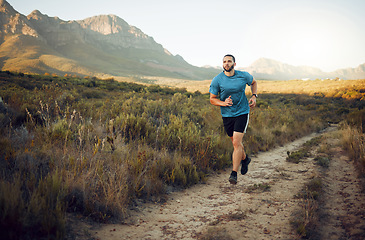 Image showing Fitness, mountain and runner running on a trail in nature for exercise, training and cardio workout outdoors. Sports, challenge and active athlete with endurance, discipline and healthy body in Italy