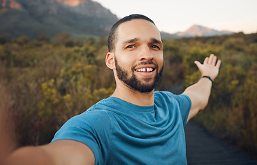 Image showing Fitness, running and man taking a selfie on mountain during outdoor run. Young runner on hike, workout and exercise in nature takes picture of scenic view. Hiking, travel and adventure in Australia