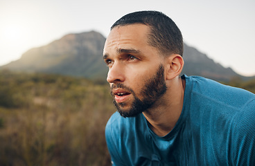 Image showing Fitness, mountain and nature man tired after workout run, exercise or sports training for body, health or mindset wellness. Running motivation, countryside and marathon runner exhausted after cardio