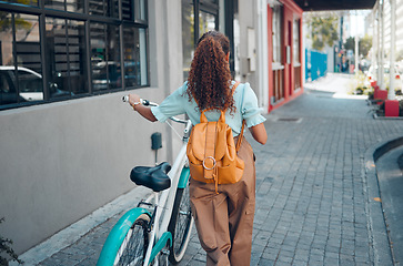 Image showing Woman, bike or city travel with eco friendly, carbon footprint environment sustainability or future green energy transport. Fashion student, cool and model walking with bicycle on Brazilian sidewalk