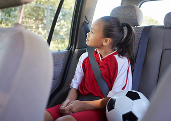 Image showing Child in car interior, travel transport to football and soccer athlete sitting in motor vehicle. Young sports athlete in Brazil fitness training, journey to game in back seat and kid safety seat belt