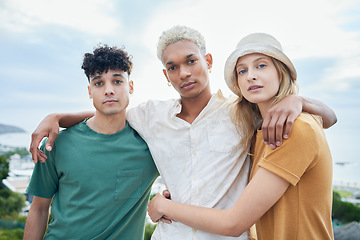 Image showing Youth, fashion and portrait of friends hug on holiday, adventure and vacation at the beach. Summer, friendship and men hugging woman to bond in nature. Diversity, outdoor and modern group style