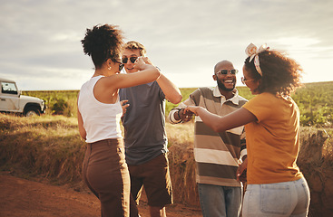 Image showing Freedom, dance and friends on a road trip adventure, journey or holiday in the countryside. Diversity, happy and young people dancing together to music in celebration of their outdoor summer vacation