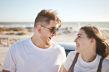 Image showing Travel, beach and holiday in summer with happy couple smile, love and laugh while on the ocean by the seaside. Happy french man and woman enjoy exotic honeymoon having fun at sea tropical vacation