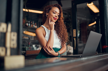 Image showing Woman, laptop and thinking in coffee shop, restaurant or Brazilian cafe for remote work, fashion blog writing or ebook ideas. Happy smile, student or style entrepreneur on technology blogging website