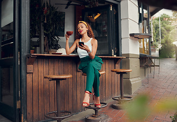 Image showing Coffee shop, smartphone and black woman on social media mobile app with cafe online review, marketing and advertising customer experience. Influencer at restaurant with latte, using phone and typing