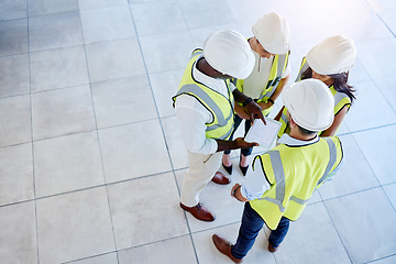 Image showing Architecture, construction and engineering team planning a creative blueprint of a building on a tablet in an office. Teamwork, collaboration and group meeting of designers working on a floor plan