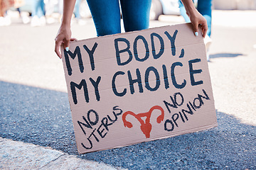 Image showing Protest, woman and human rights poster for abortion activism choice, decision and discrimination. Feminist, politics and pregnancy termination activist rally sign for fetus law justice in city.