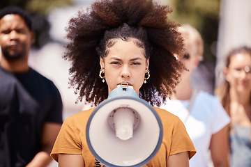 Image showing Freedom, revolution and megaphone with woman in protest event for community, support and leadership in rally. Global, social justice and human rights with gen z crowd for equality, future or politics