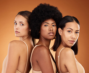 Image showing Beauty, diversity and skincare with woman friends in studio on a brown background for health or inclusion. Portrait, empowerment and wellness with a female model group posing for healthy skin