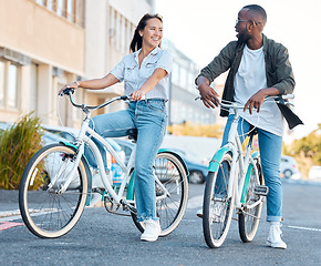Image showing Couple in street, bicycle and eco friendly travel, happy and clean carbon footprint in cityscape. Environment, transportation and urban, young man and woman, health and fitness, wellness and exercise