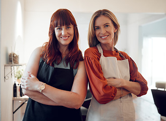 Image showing Salon, teamwork and hair care with a woman hairdresser team standing arms crossed in their small business. Collaboration, startup and haircut with a a female employee and designer colleague at work