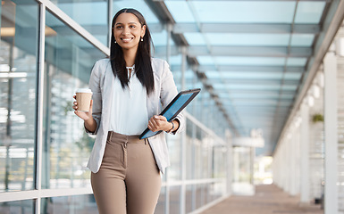 Image showing Walking, smile and business woman with coffee and a folder for work in the city of Germany in the morning. Happy, young and corporate employee with vision, motivation and tea for professional career