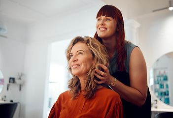 Image showing Hairdresser, senior woman client and hair care consultation with young hairstylist in training. Happy customer, stylish hairstyle cosmetic treatment and luxury beauty salon professional worker