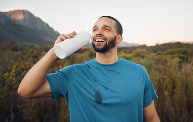 Image showing Runner, mountain nature and man drinking water after running. Break, relax and male from South Africa with refreshing liquid after training, workout or exercise on grass field for fitness or health.