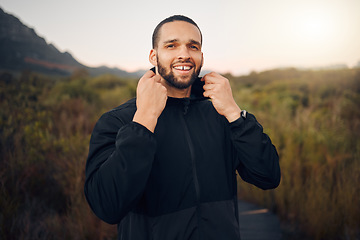 Image showing Happy man, nature and fitness training while hiking for freedom, health and wellness in mountains with exercise. Portrait and face of male running with hoodie fashion for a calm and healthy workout