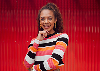 Image showing Fashion, happy and black woman against a red wall in the city of Japan for travel holiday. Portrait of a young, urban and African girl with cool clothes on a vacation for freedom and happiness