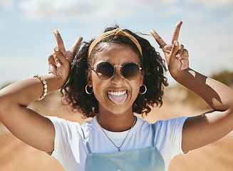 Image showing Peace, portrait and happy gen z girl on summer holidays, vacation or having fun on a weekend outdoors. Freedom, traveling and young woman with cool, trendy and swag with a v hand sign in Las Vegas