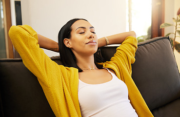 Image showing Sleeping, relax and black woman on the sofa in the living room for peace in her house. Content, happy and African girl with sleep for wellness, freedom and calm on the couch in the lounge of her home