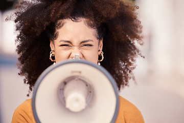 Image showing Megaphone, speaker and black woman leading a street protest for change, equality and democracy. Noise, politics and unemployment crisis with frustrated female taking action, demand government help