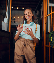 Image showing Happy gen z young woman with smartphone, social media fashion influencer in trendy cafe and youth culture in Miami. .Trendy student communication, reading text on cell and 5g technology connection