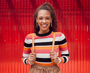 Image showing Fashion, happy and trendy black woman against red background, having fun exploring city destination. Portrait, smile and travel with exchange student enjoying a trip in New York, cheerful and excited