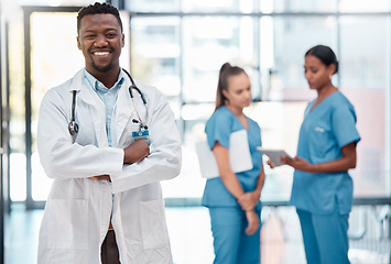 Image showing Black man, portrait doctor and healthcare leader hospital, clinic and professional medical office, trust and quality service. Happy african medicine worker, expert surgeon and arms crossed in surgery
