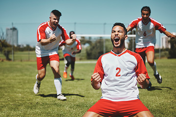 Image showing Team, success and winner by soccer player celebration during game at soccer field, happy, cheering and victory. Sport, achievement and goal by football team running and celebrating football field win