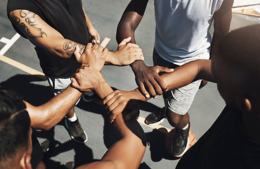 Image showing Wrist hands, sports teamwork and support, collaboration and cooperation for basketball court game. Above athlete group solidarity, partnership and motivation of goals, trust and friends commitment
