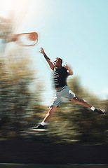 Image showing Basketball, sports and goals with man and jump in park court training for fitness, health and workout. Energy, action and exercise with athlete in playing game for competition, wellness and winning