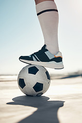 Image showing Fitness, city soccer and foot on ball, friendly game in summer heat, man ready to score goals closeup. Football, motivation and healthy urban workout, fun with training, practice and a soccer ball.