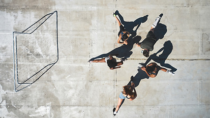 Image showing Sports, soccer and fitness team stretching, exercise and prepare for game run, competition or training practice top view. Teamwork, workout and healthy group of people ready for football match cardio