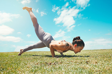 Image showing Meditation, energy and woman doing yoga on a field for zen, fitness and exercise in nature. Pilates, wellness and sports lady plank, training and practicing posture, strength and balance handstand