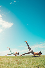 Image showing Pilates training, fitness friends and field for wellness goal, accountability motivation and blue sky summer lens flare mock up. Outdoor stretching women or personal trainer with yoga exercise mockup