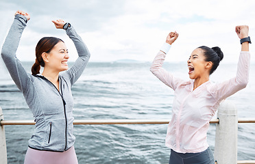 Image showing Fitness, celebration and excited girl friends cheer over exercise achievement, marathon training or cardio workout success. Running motivation, winner mindset and women with high energy celebrate