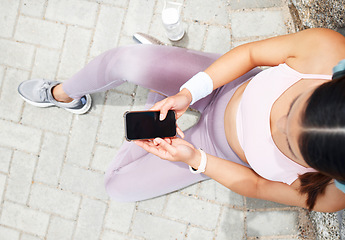 Image showing Smartphone screen, fitness mockup and woman check online app for exercise goal progress in city or park ground. Sports runner using phone for social media post, update or workout results outdoor