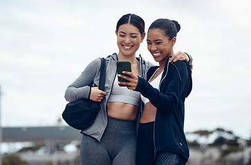 Image showing Smartphone, fitness and women friends with exercise progress app, social media results update or personal trainer selfie marketing with sky mock up. Excited sports people using phone for 5g network