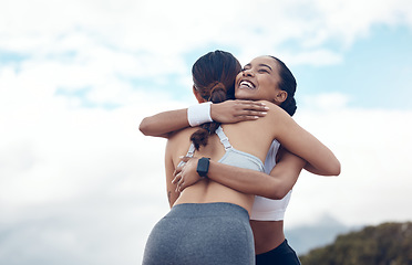 Image showing Fitness, success and friends hug in celebration of training, cardio exercise and running performance outdoors. Smile, sports and happy girl runners hugging with pride to celebrate workout progress