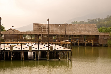 Image showing Wooden bridge and house