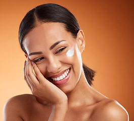 Image showing Woman, beauty and smile for skincare moisturizer, lotion or creme for soft, gentle healthcare against a studio background. Happy satisfied female in care for healthy smooth skin or cosmetic treatment